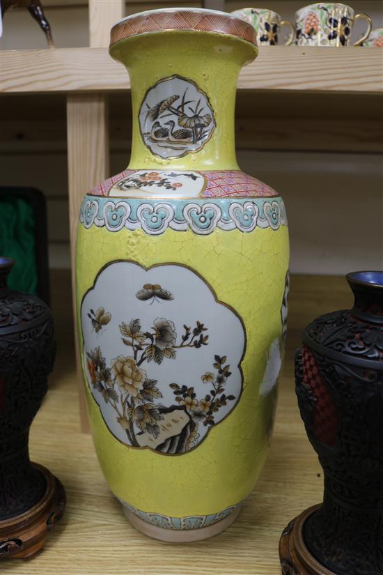 A pair of Chinese two colour carved lacquer vases and a Chinese yellow ground vase tallest 46cm